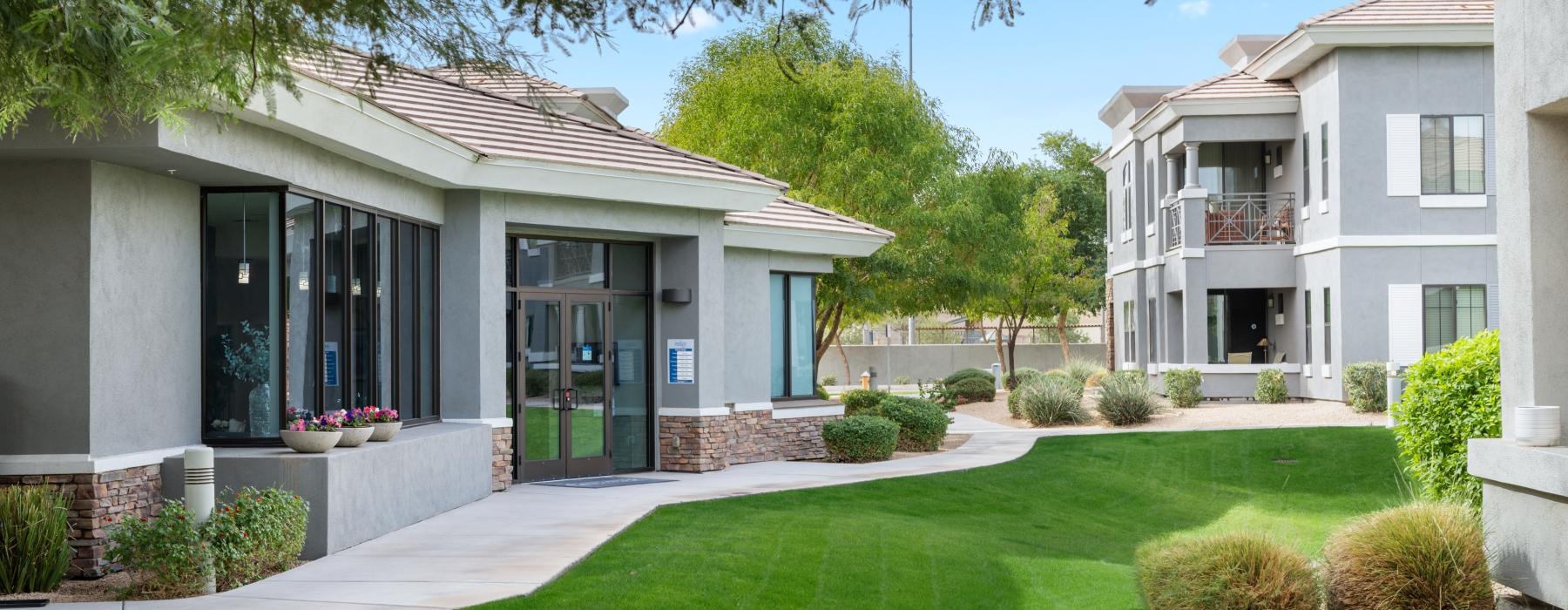 a house with a green lawn