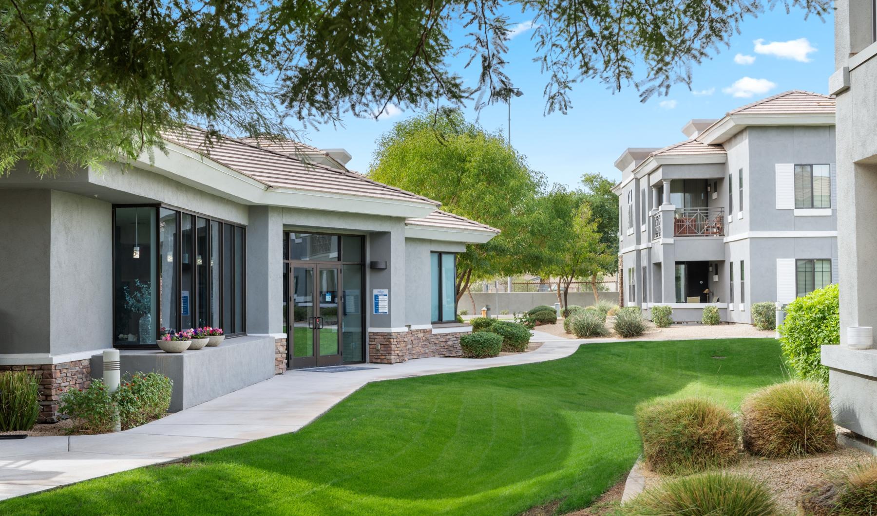 The essence of exceptional living a house with a green lawn