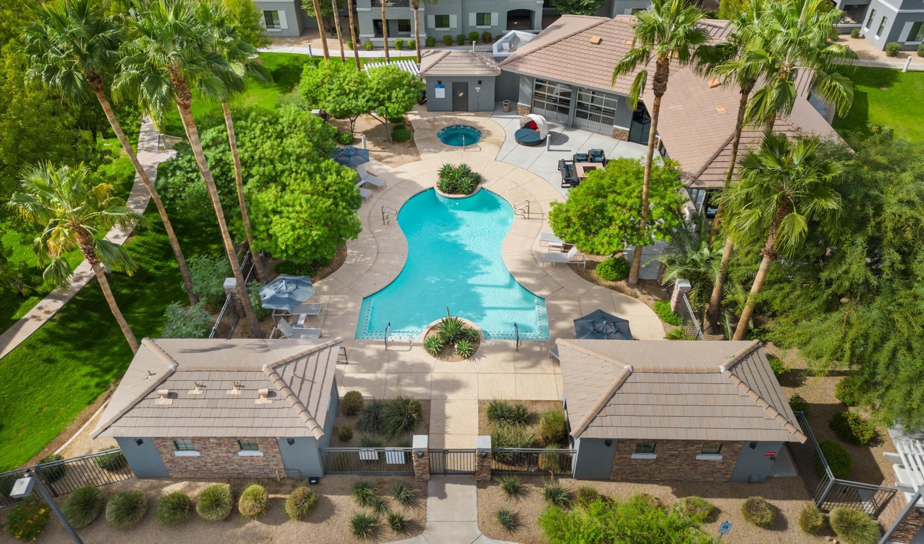 Find your perfect fit at Indigo Apartments a swimming pool surrounded by houses